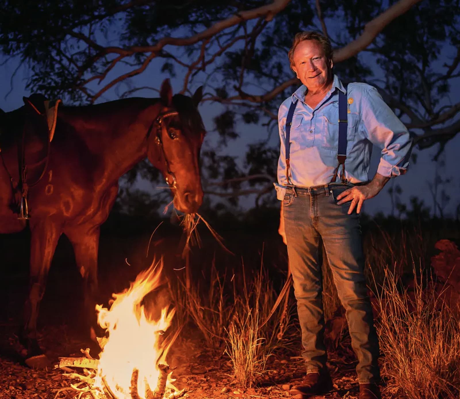 Andrew Forrest with a horse on his family's cattle ranch in Australia