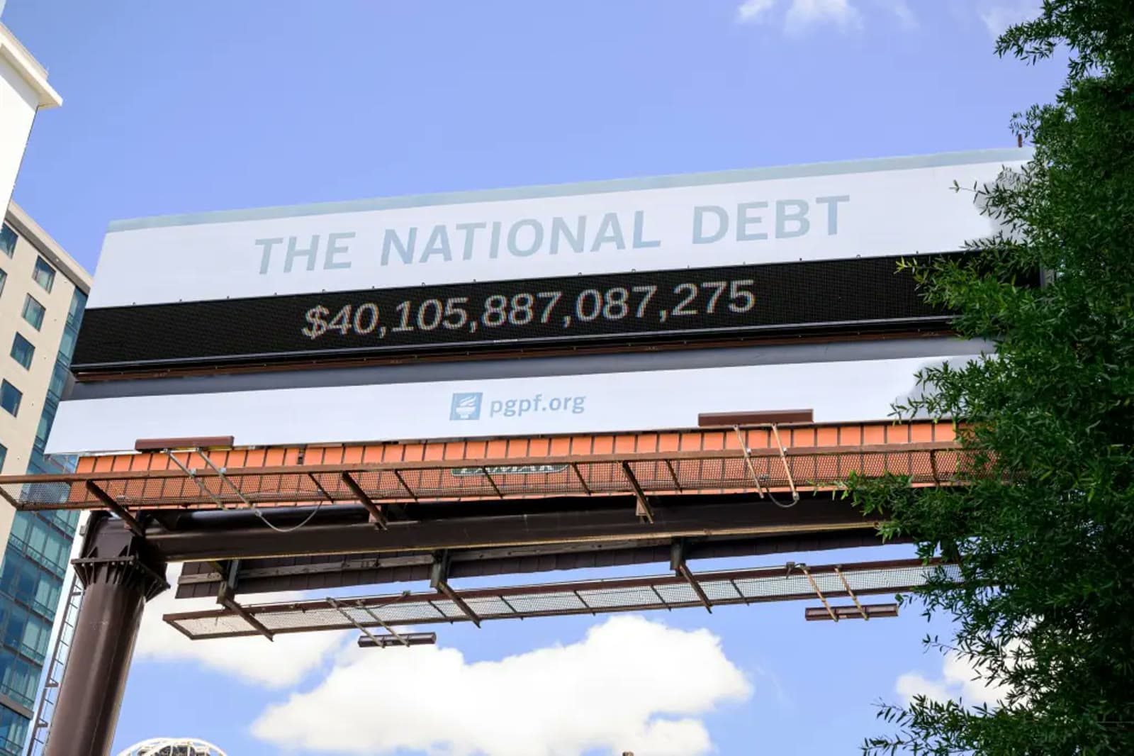 A billboard displaying a running count of the US national debt