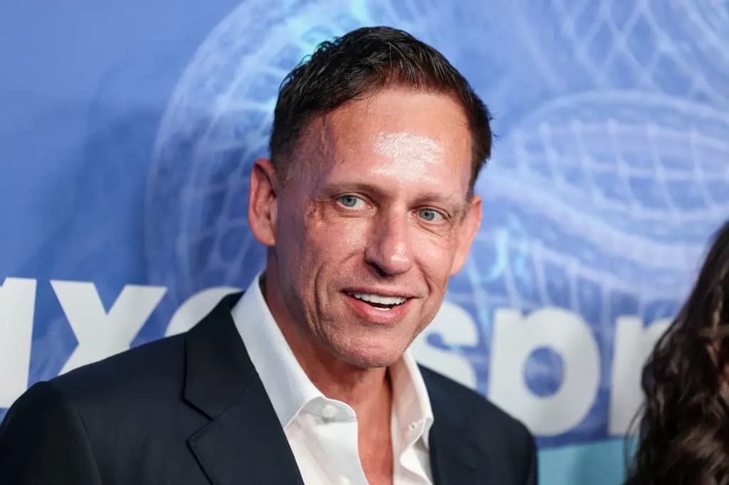 Peter Thiel smiling at a media event