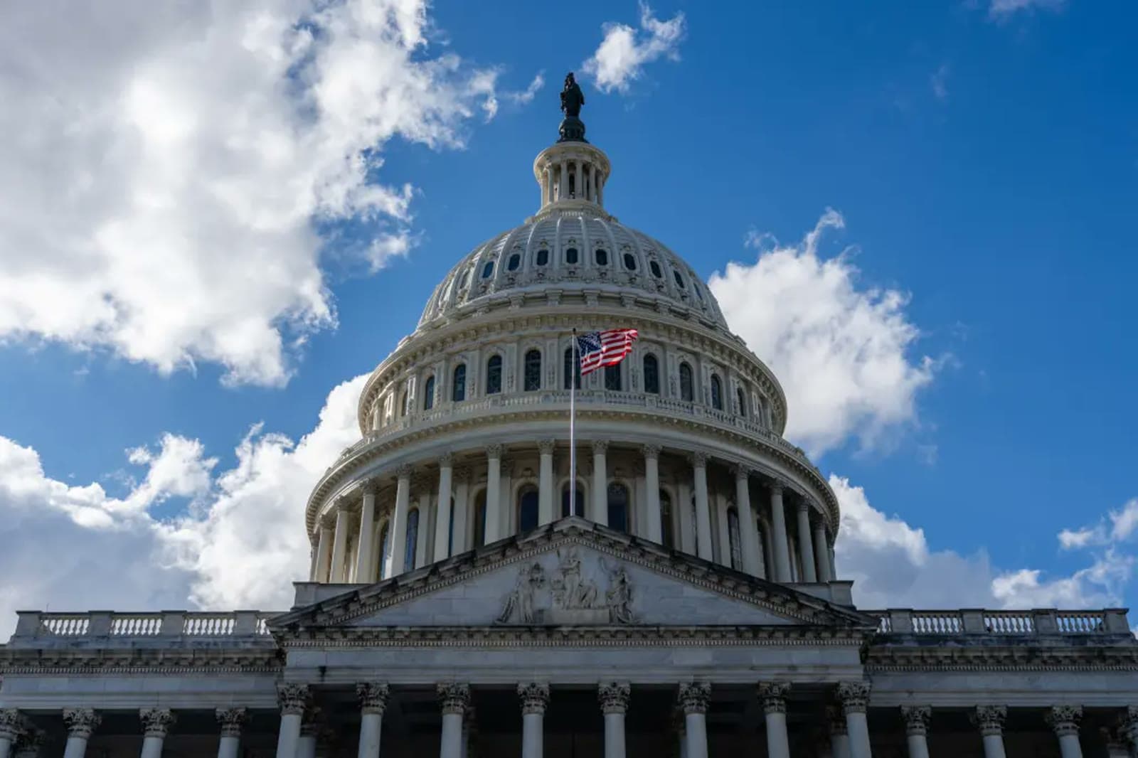 The dome of the U.S. Capitol building against a blue sky